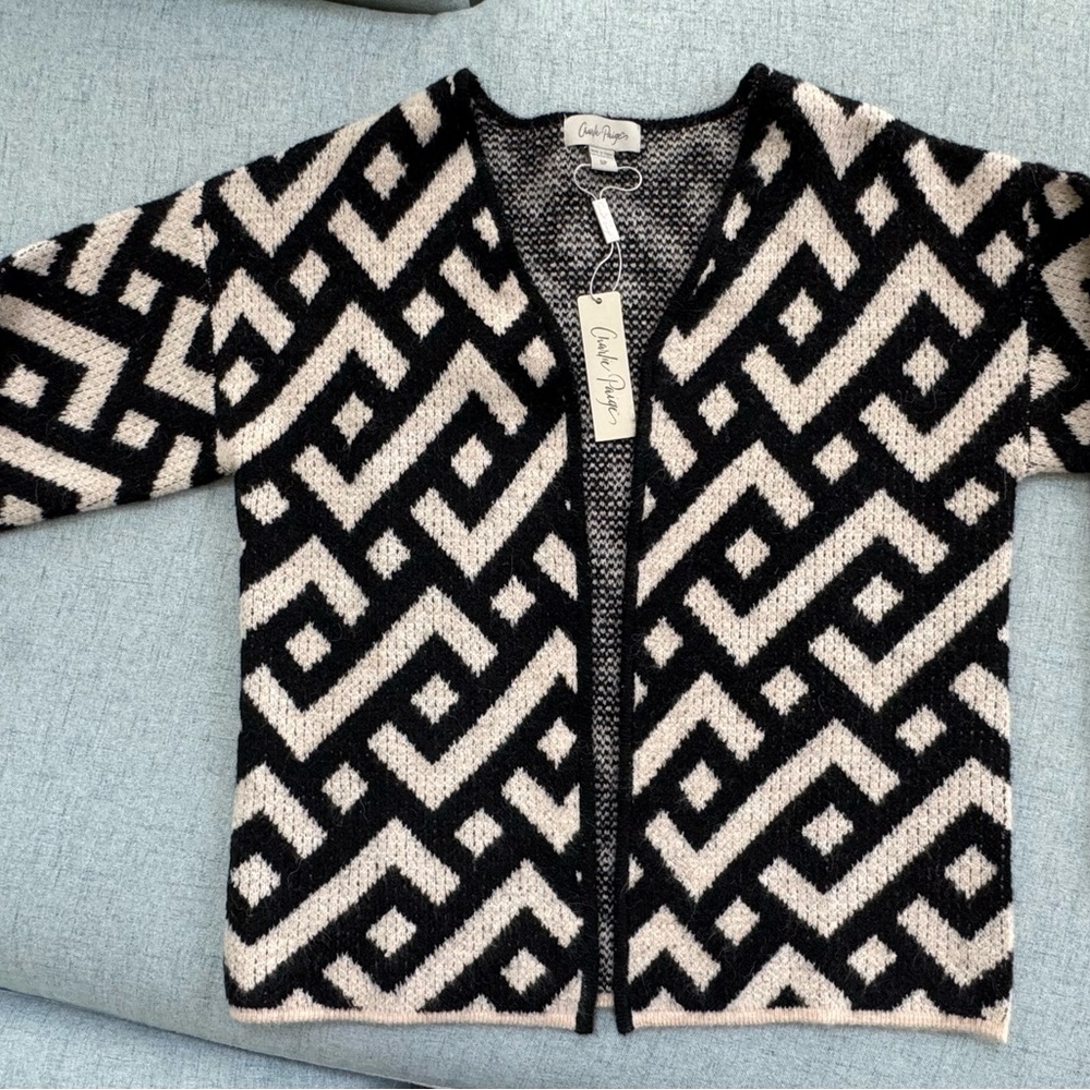 Chic Black and Cream Geometric Sweater